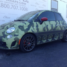 Vehicle wrapping that looks like a tank