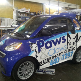 Paws & Claws Veterinary Clinic - Smart car vehicle wrap for business