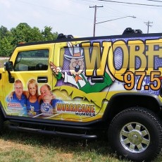vinyl-wraps-installed-on-a-Hummer-H2-for-Bristol-Broadcasting-radio-station-WQBE-97.5