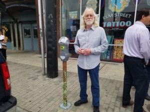Artist Terry Hays displays his original design for a parking meter in Deep Ellum.